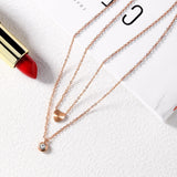 NEHZUS Titan-Halskette in Roségold-Beschichtung, doppellagig, herzförmig, mit Diamanten als Geschenk für die Freundin