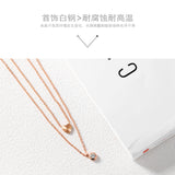 NEHZUS Titan-Halskette in Roségold-Beschichtung, doppellagig, herzförmig, mit Diamanten als Geschenk für die Freundin
