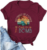 Les femmes ne sont pas fragiles comme une fleur Fragile comme une bombe T-shirt graphique